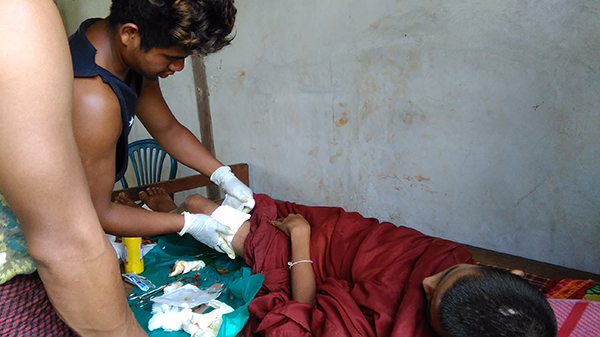 The Pa-Oh Ranger team providing medical support to villagers.