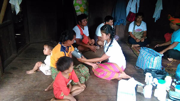 The Pa-Oh Ranger team providing medical support to villagers.