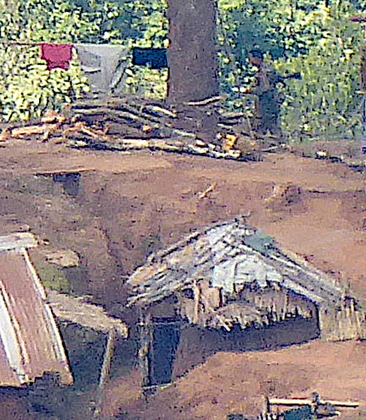 Burma Army soldier with his weapon.