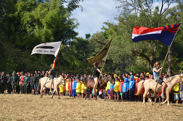 Riding in with the flags at the end of the program.