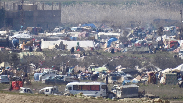 More of the tents and vehicles trapped by ISIS.