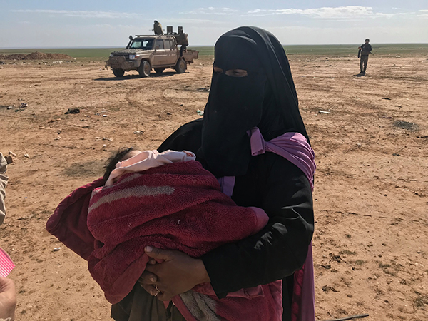 An ISIS mother escapes to SDF lines. 