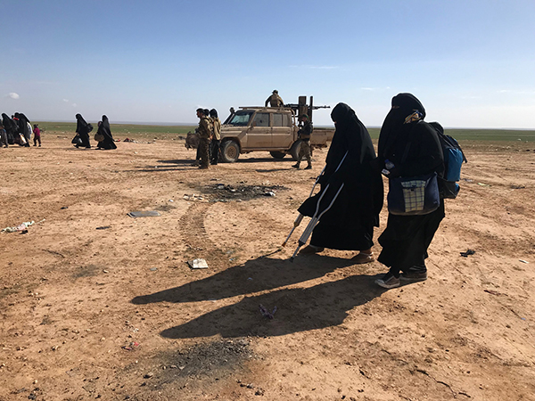 A wounded girl fleeing ISIS.