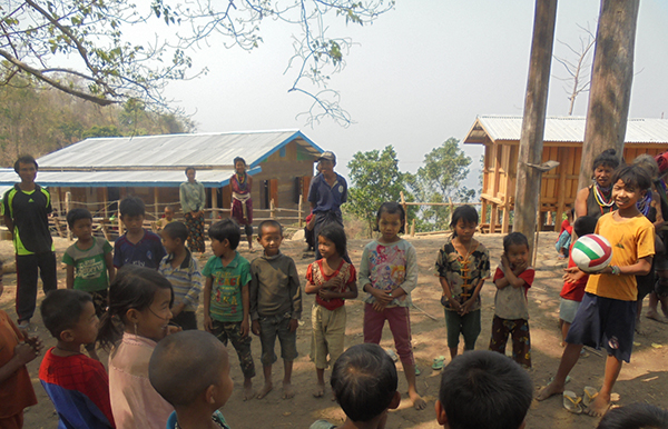 Local kids line up for a game during a program.