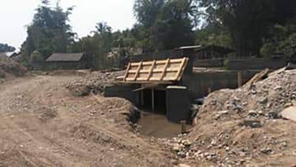 The road and bridge under construction by the Burma Army.