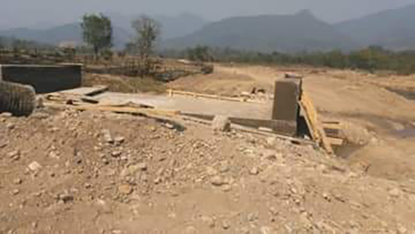 The road and bridge under construction by the Burma Army.