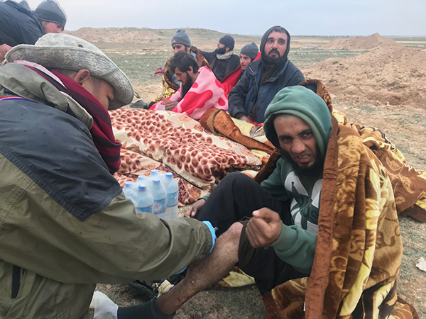 An ISIS man receiving medical care from the team.