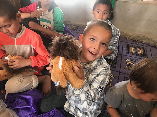 A boy and his new lion from ATP Ministries.