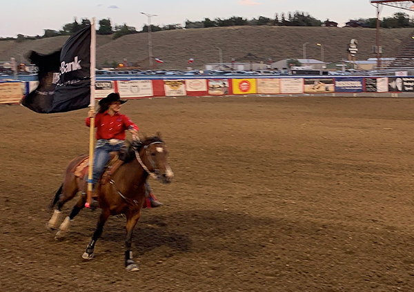 Both Sahale (two photos above) and Suu (immediately above) got to ride as flag girls - an honor and show of their skill!