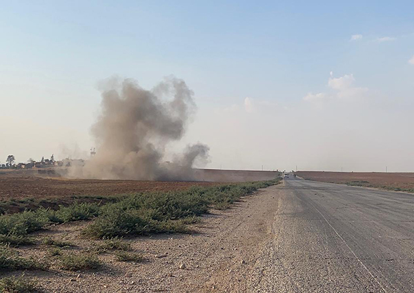 Visible smoke from where a strike landed in front of us near Soda Village.