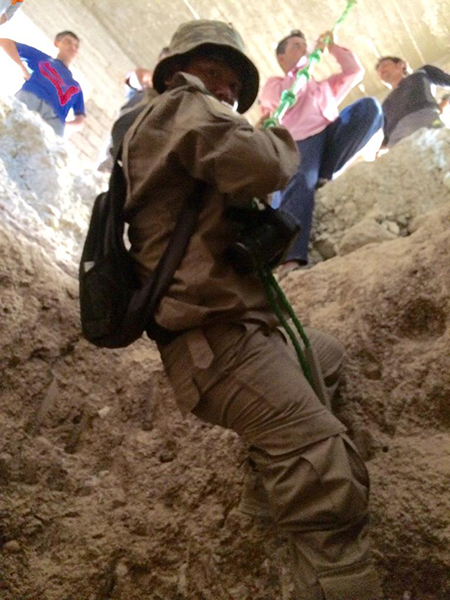 Zau Seng enters an ISIS tunnel during the operation to clear ISIS from Mosul