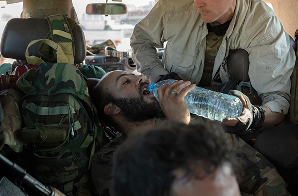 Helping evacuate the wounded Syrian Army soldiers who were hit by Turkish/FSA mortars on Nov. 9.