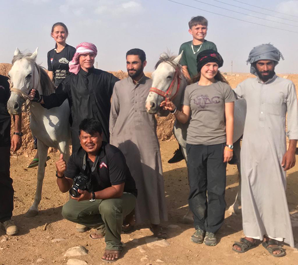 Zau Seng pictured with Dave, Sahale, Suu, and Peter Eubank and new friends in the Middle East