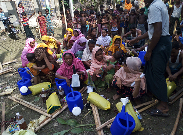 Giving supplies to villagers