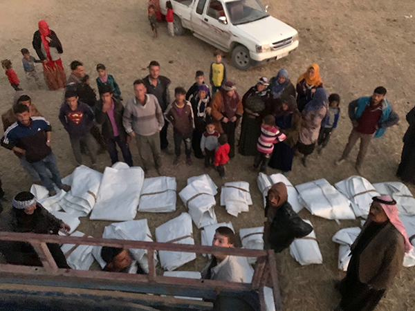 More supplies being handed out during a distribution.