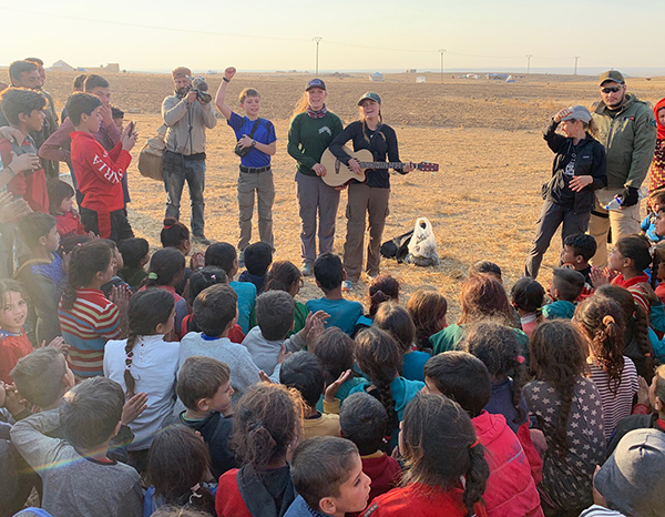 The team leads a Good Life Club for displace families in the desert.