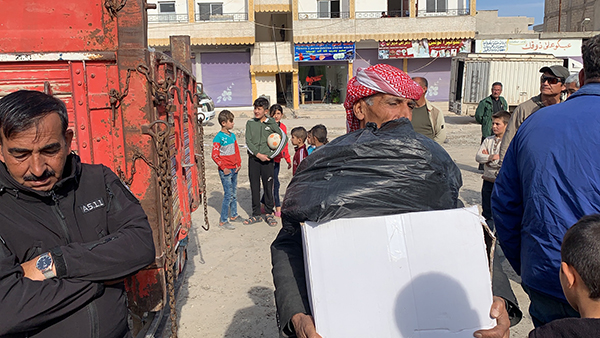 Families receive supplies.