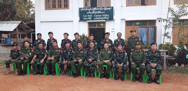 Burma Army officials (in solid green) and Karen leaders (in camo) who attended the meeting