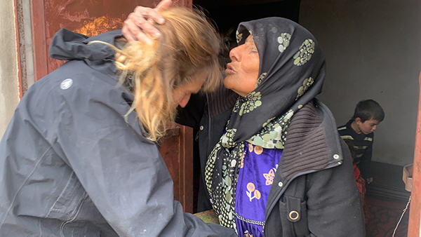 A woman from Idlib kisses Karen