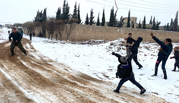 Snowball fight with Idlib kids