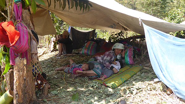 A mother with her children after fleeing