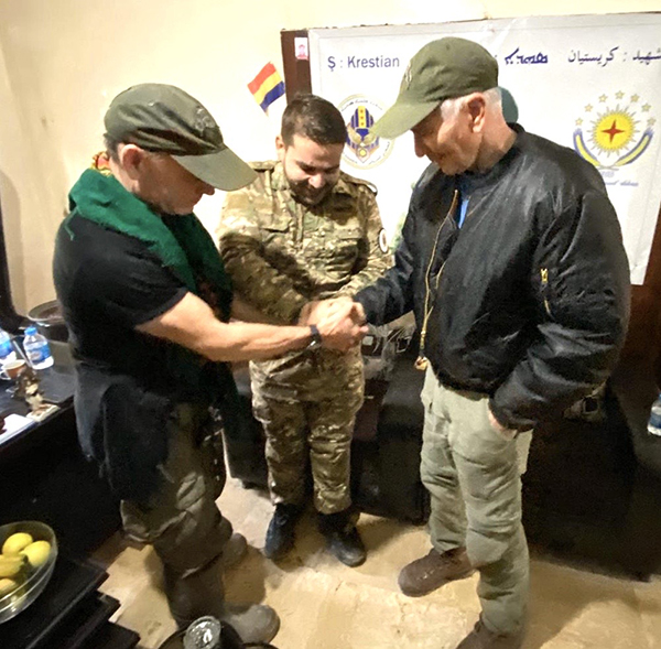 The Congressman, Commander Aram, and Dave praying together