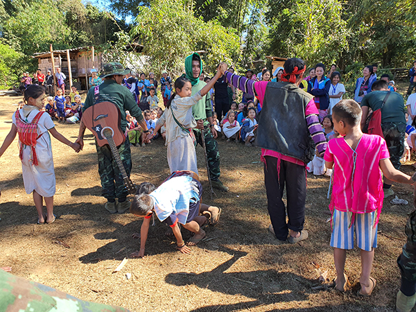 Children, pretending to be animals, enter the ark