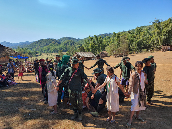 Children and villagers form the ark during the Noah's Ark skit