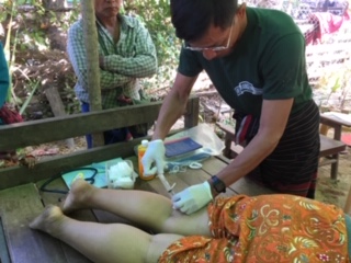 A Ranger provides medical care for a local villager