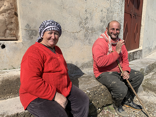 “Thank you for coming,” said this Christian farmer couple outside a church shelled by Turkey.