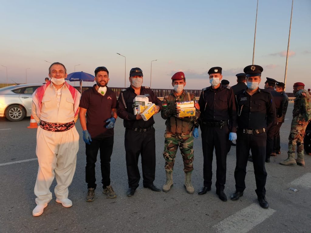 FBR team giving supplies to troops and police in Erbil.