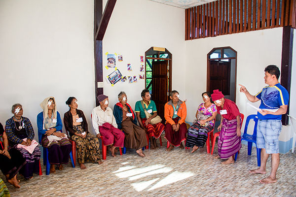 Nay Hser delivers post-op instructions to patients who had undergone cataract surgery the day before.