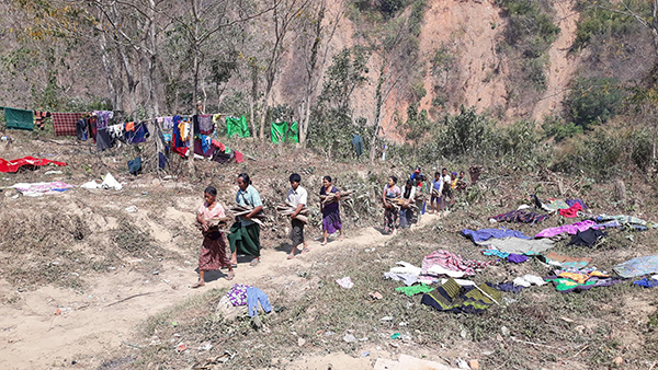 Chin villagers fleeing from the Burma Army jet attacks