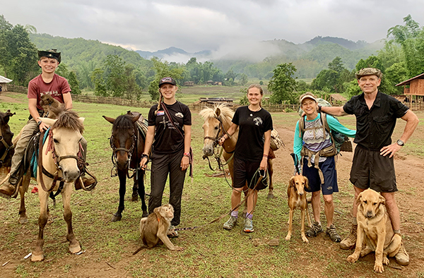 Pictured from left to right: Peter, Suu, Sahale, Karen, and Dave along with Kid the Monkey, dogs Ninevah and Mahji, and some of the horse/mule team during a recent mission in Karen State, Burma.