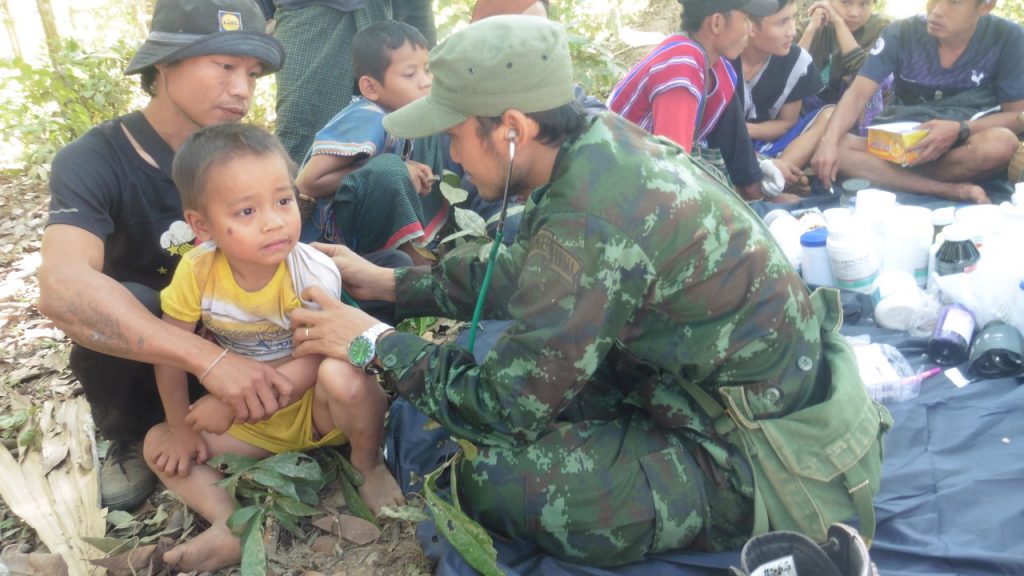 FBR medic treats a sick child