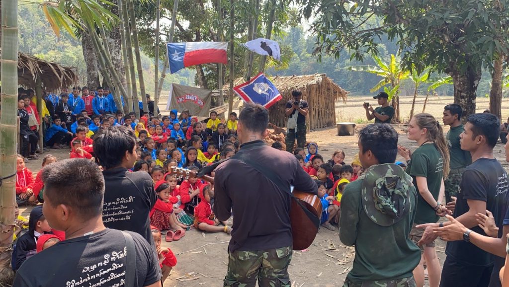 Unity in the jungle as Arakan, Karenni and Karen team members sing for the displaced children