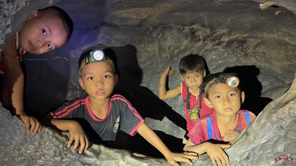 children hiding in a cave
